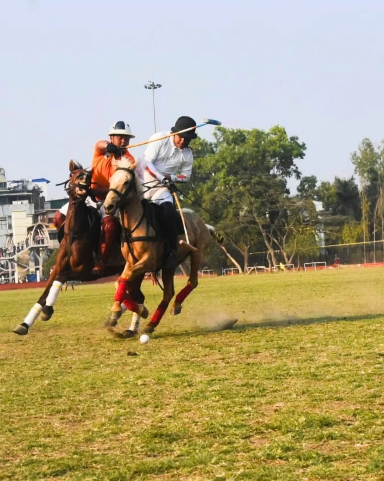 Leishemba (in white) in the 32nd Governor’s Cup Invitation final, Mapal Kangjeibung, 28-02-2026. Photo 4 of 5.